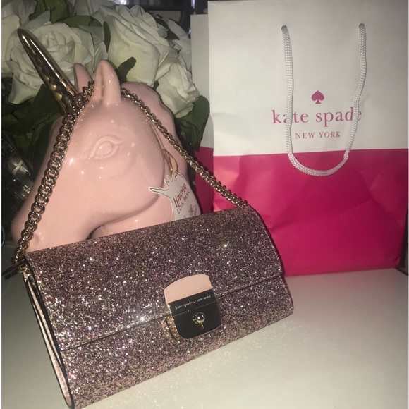 kate spade Handbags - NEW Kate Spade Clutch Wallet Purse Rose Gold 🎀